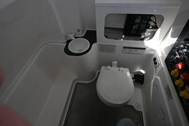  Yacht Photos Pics 2020 Sea Fox 288 Commander boat bathroom with toilet and sink.