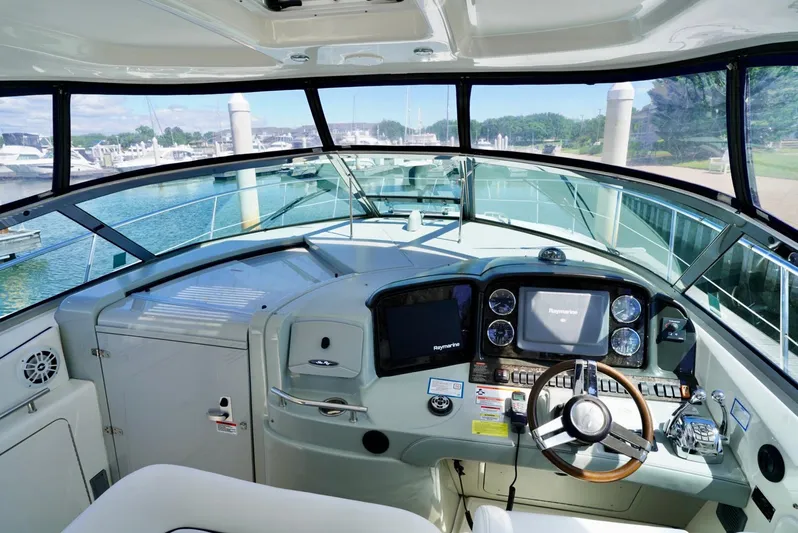  Yacht Photos Pics Helm of 2010 Sea Ray 390 Sundancer yacht with modern navigation equipment.