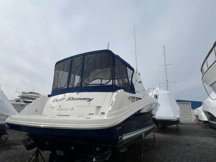  Yacht Photos Pics 2010 Sea Ray 390 Sundancer yacht on dry dock, rear view with covered cockpit.