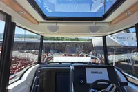 Interior view of 2023 Nimbus Commuter 8 boat with Simrad navigation system.