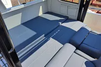 Interior of 2023 Nimbus Commuter 8 with convertible seating and modern design.