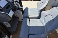 2023 Nimbus Commuter 8 interior with dual gray seats and steering wheel.