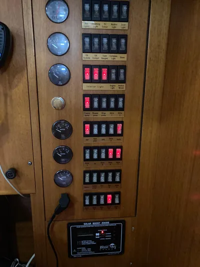 Maloose Yacht Photos Pics Electrical control panel on a 2001 Malo 43 boat with gauges and switches.