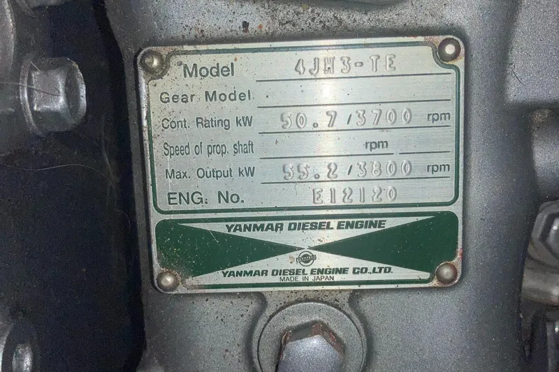 Maloose Yacht Photos Pics Yanmar diesel engine label, model 4JH3-TE, specifications and serial number.