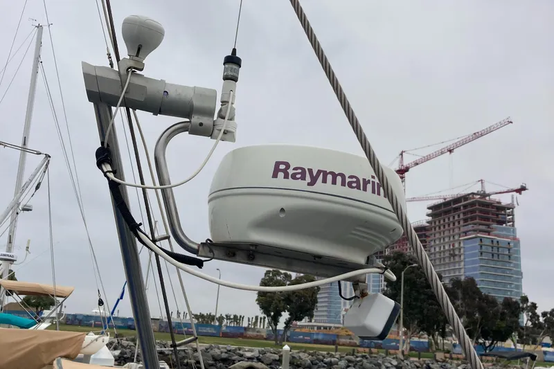 Maloose Yacht Photos Pics Raymarine radar on Malo 43 sailboat, 2001 model, docked near construction site.