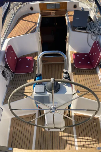 Maloose Yacht Photos Pics Sailboat Malo 43, 2001 model, featuring a wooden deck and steering wheel in the cockpit.