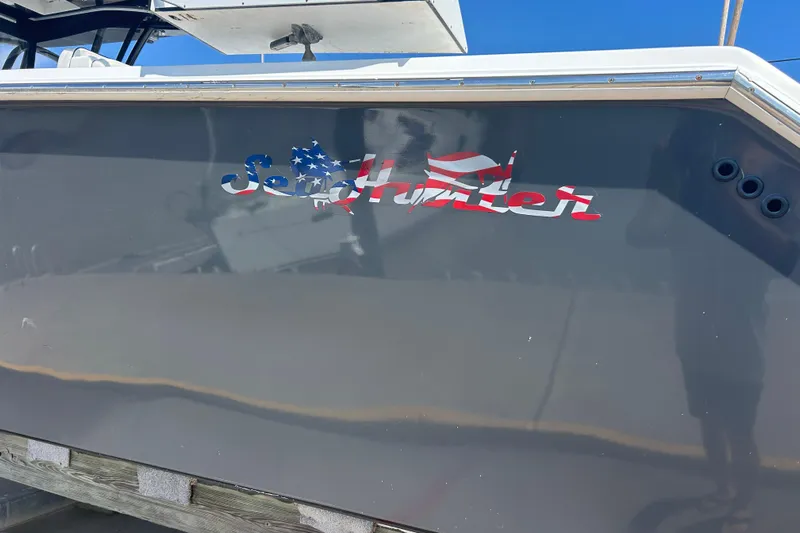  Yacht Photos Pics 2016 SeaHunter 39 Tournament boat with American flag-themed logo on the side.