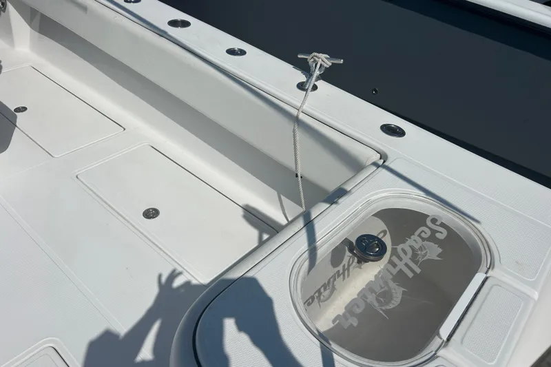  Yacht Photos Pics 2016 SeaHunter 39 Tournament boat deck with storage compartments and rope.