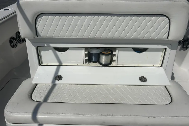  Yacht Photos Pics 2016 SeaHunter 39 Tournament boat storage compartment with fishing line spools.