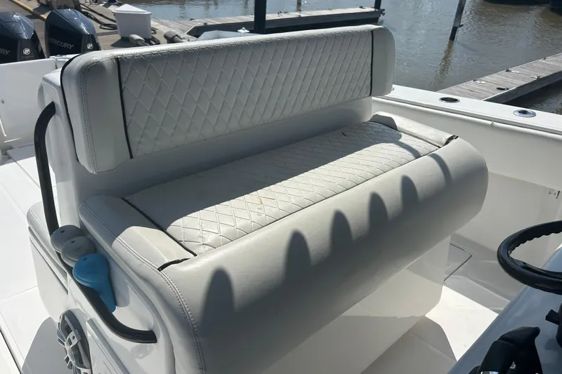  Yacht Photos Pics 2016 SeaHunter 39 Tournament boat with cushioned seating and diamond-pattern upholstery.