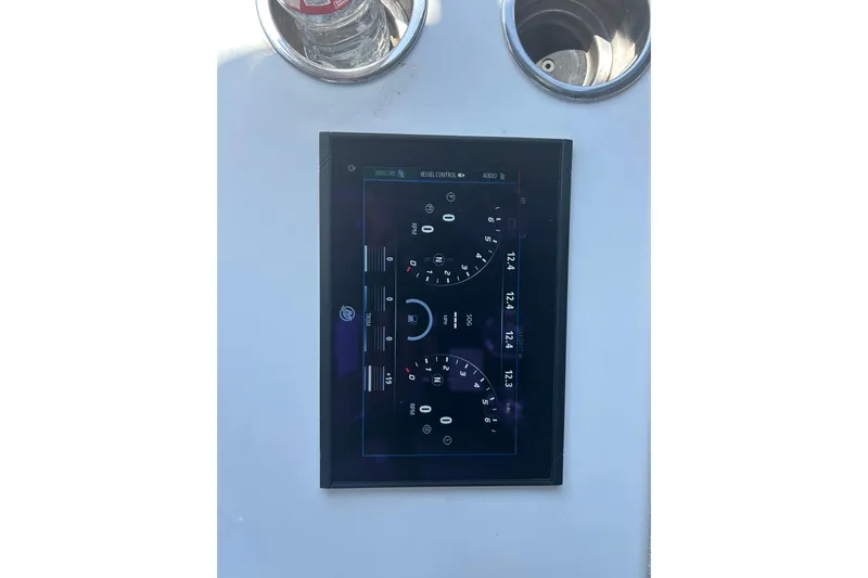  Yacht Photos Pics Control panel of 2016 SeaHunter 39 Tournament boat with digital display and cup holders.