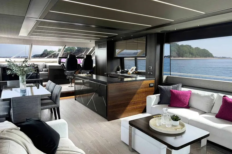  Yacht Photos Pics Luxurious interior of 2023 Sunseeker 76 Yacht with modern furnishings and ocean view.