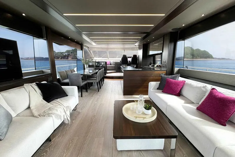  Yacht Photos Pics Luxurious interior of 2023 Sunseeker 76 Yacht with elegant seating and panoramic ocean views.