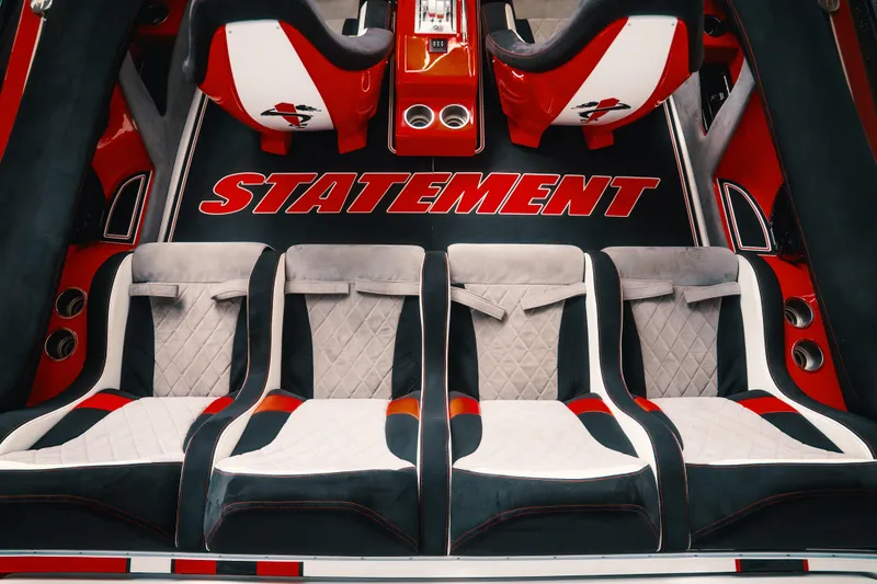  Yacht Photos Pics Luxurious interior of 2025 Statement 360 CAT with stylish seating and bold branding.