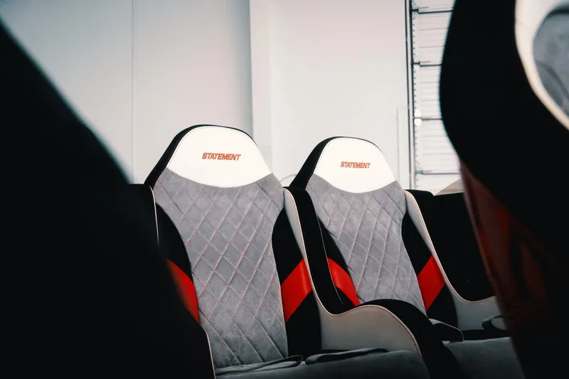  Yacht Photos Pics Modern Statement 360 CAT car seats, 2025 model, featuring sleek design and red accents.