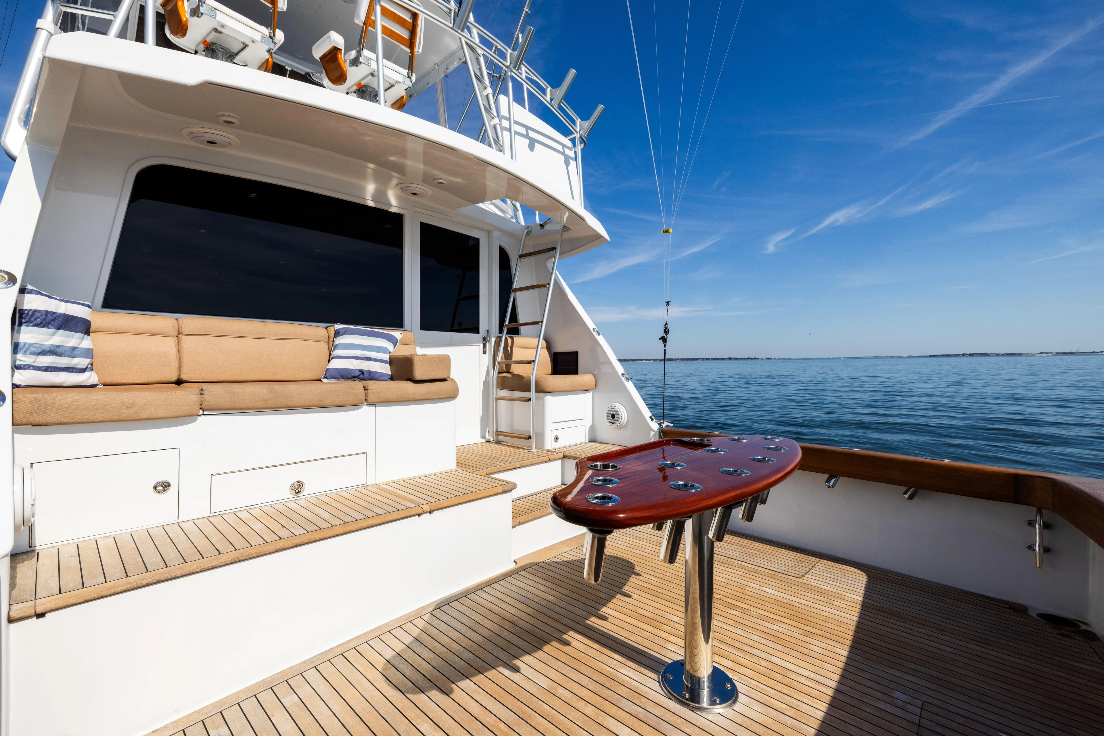 Lay Line Yacht Photos Pics Luxurious 1996 Jim Smith 60 Sportfish yacht with spacious deck and seating area.