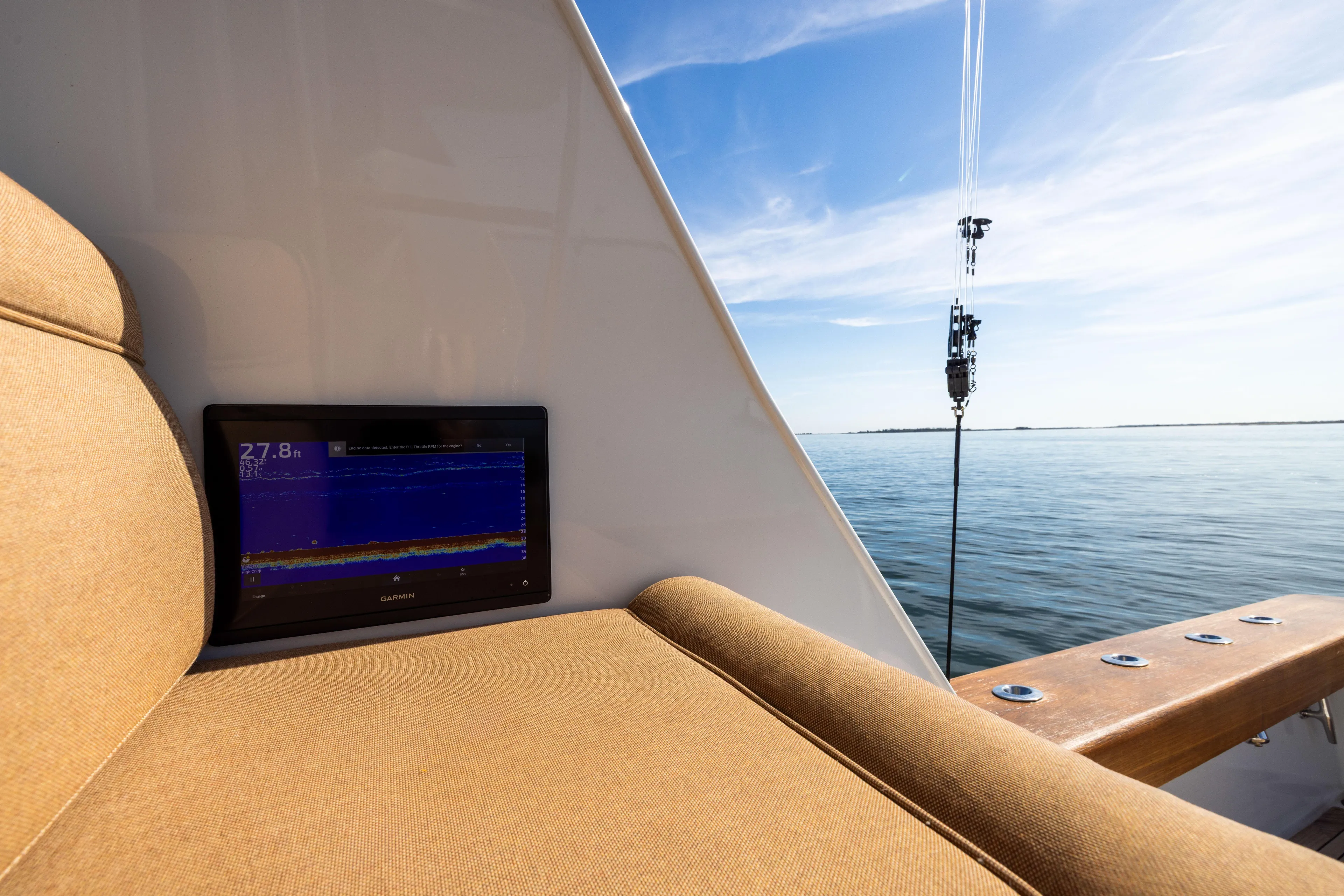 Lay Line Yacht Photos Pics Jim Smith 60 Sportfish 1996 boat with Garmin display, ocean view, and fishing rod.