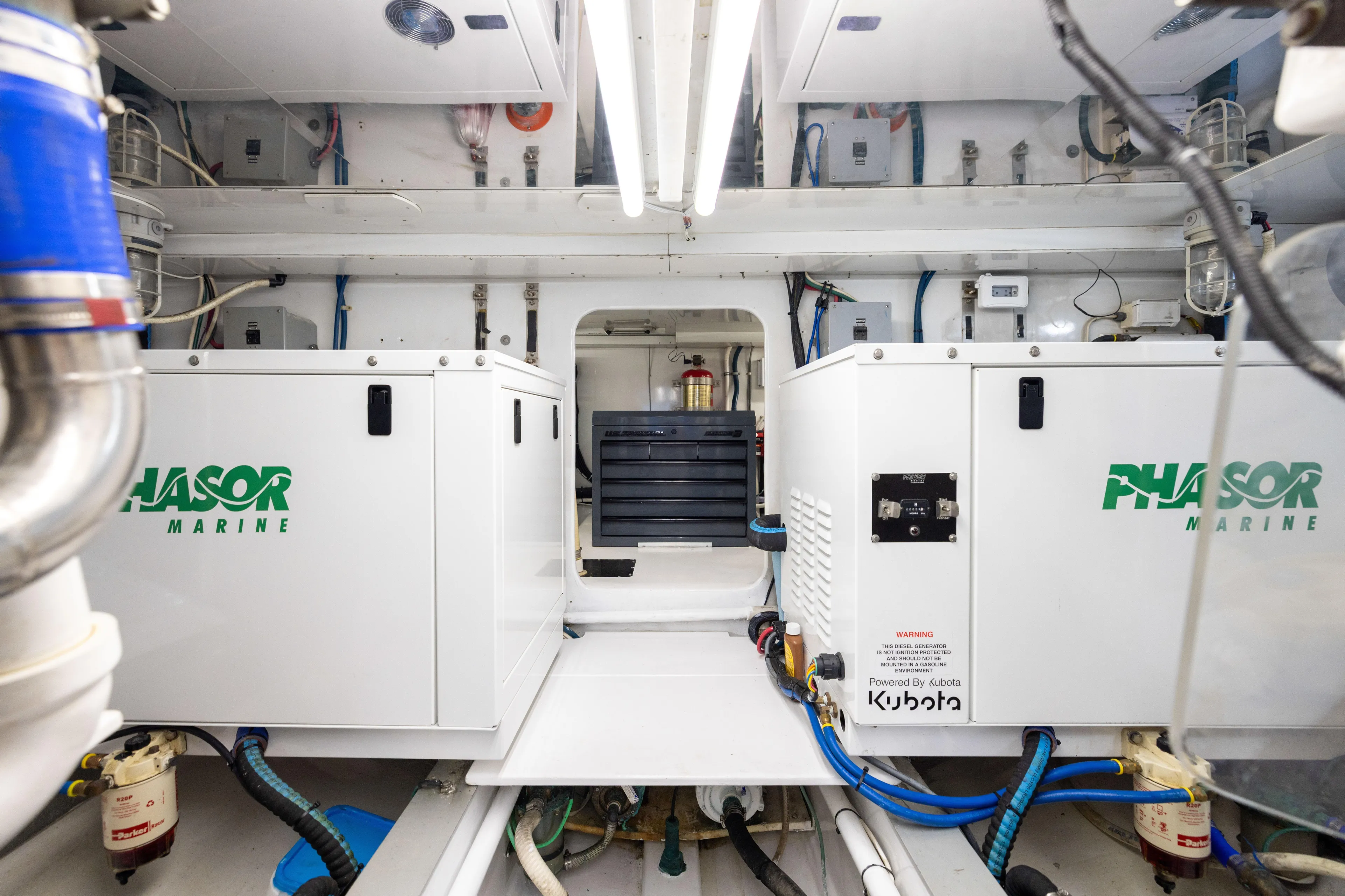 Lay Line Yacht Photos Pics Engine room of 1996 Jim Smith 60 Sportfish with Phasor Marine generators.