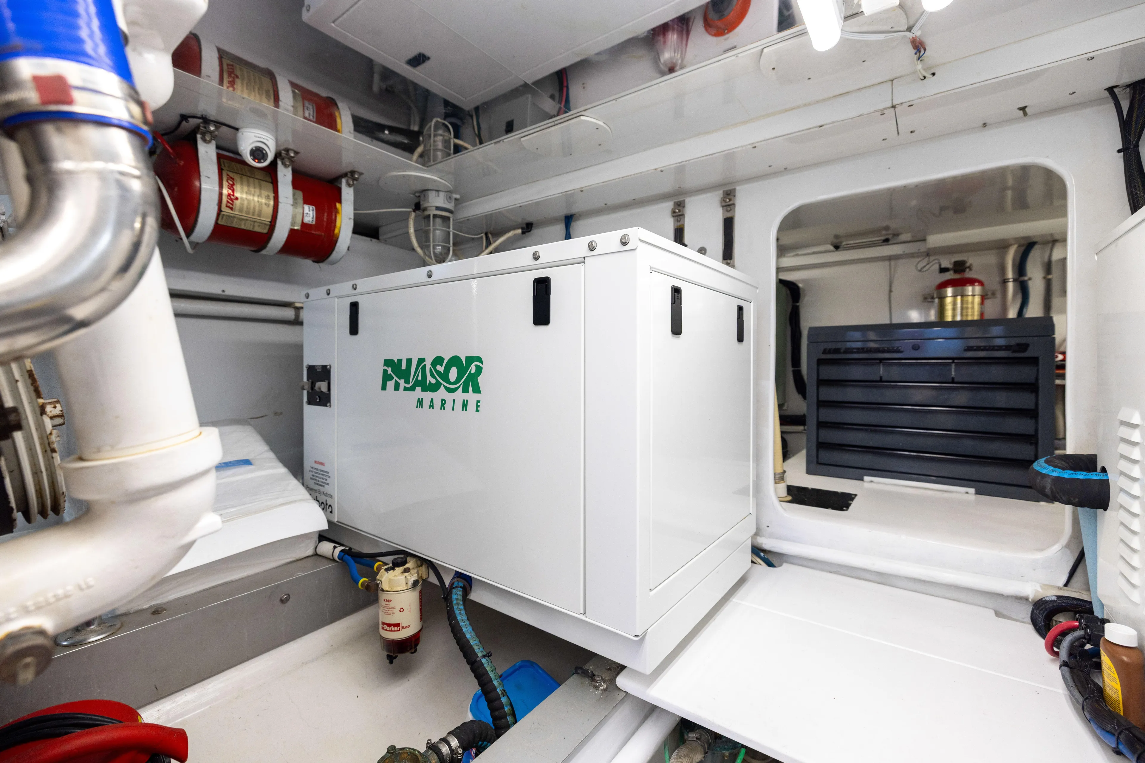 Lay Line Yacht Photos Pics Engine room of 1996 Jim Smith 60 Sportfish with Phasor Marine generator.