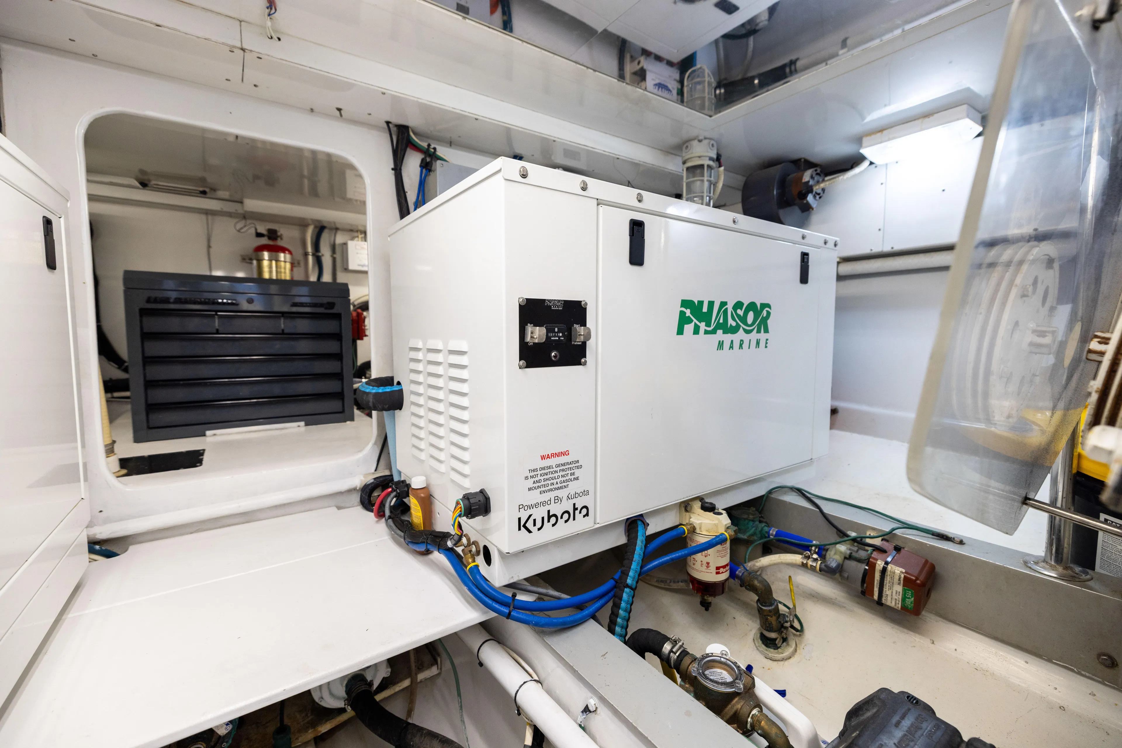 Lay Line Yacht Photos Pics Engine room of 1996 Jim Smith 60 Sportfish with Phasor Marine generator.