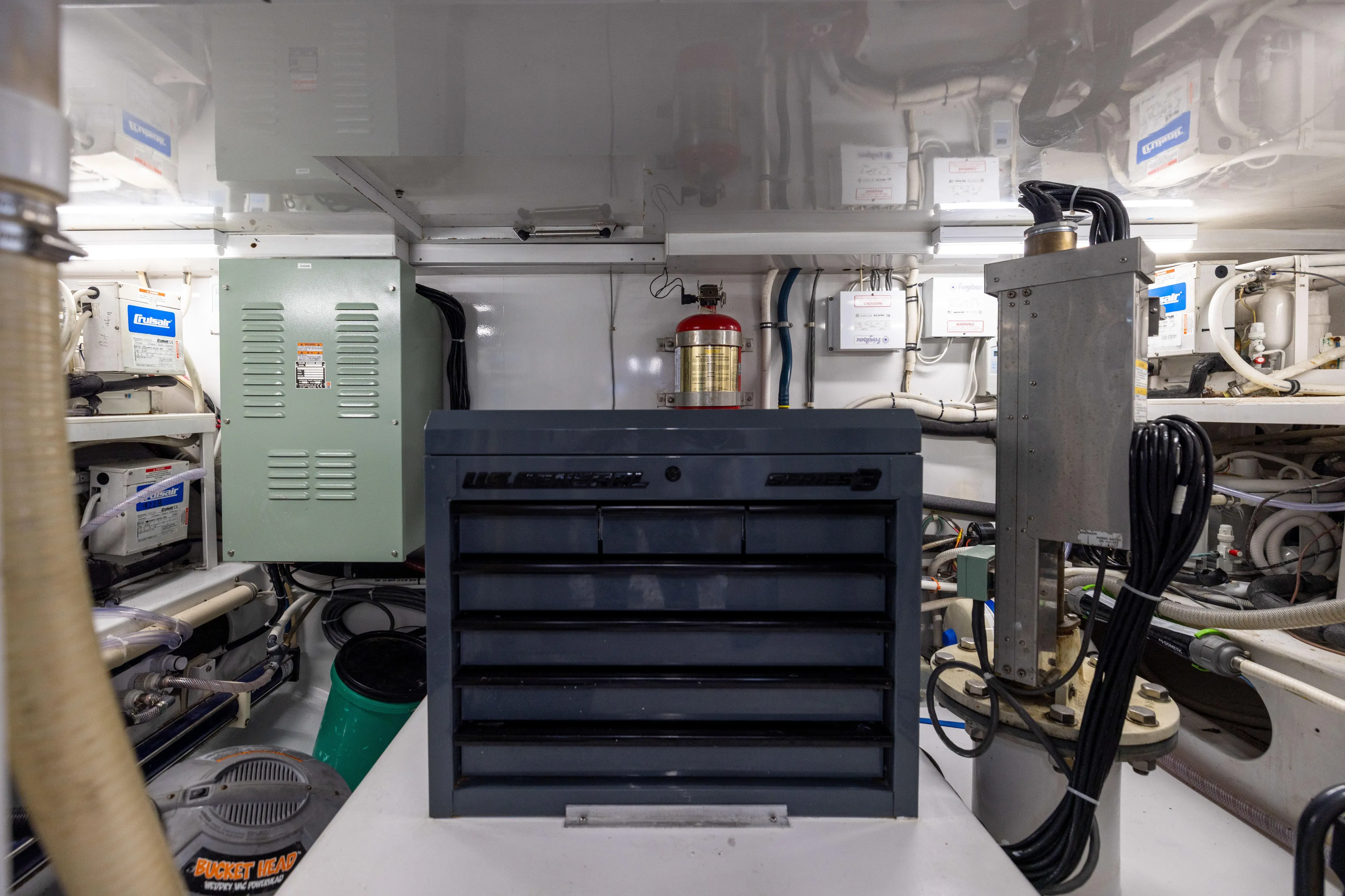 Lay Line Yacht Photos Pics Engine room of 1996 Jim Smith 60 Sportfish with tool chest and equipment.