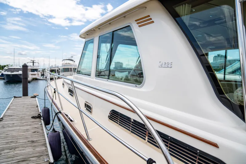  Yacht Photos Pics 2015 Sabre 48 Salon Express yacht docked at marina.