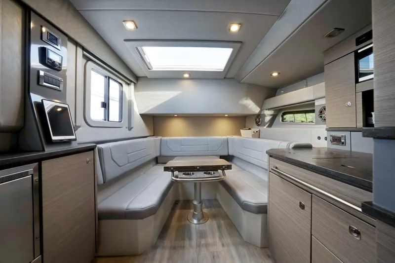 Southern Office Yacht Photos Pics Interior of 2018 Formula 430 Super Sport Crossover with modern seating and skylight.