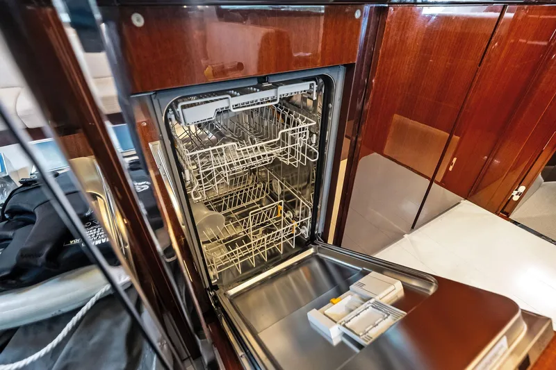 Il-viaggio Yacht Photos Pics Open dishwasher in luxurious 2021 Riva 56 Rivale yacht interior.