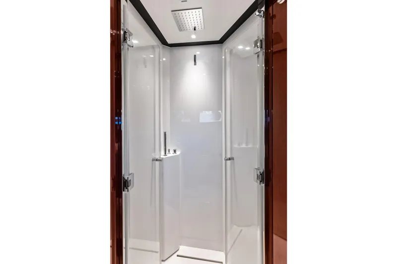 Il-viaggio Yacht Photos Pics Luxurious shower cabin in 2021 Riva 56 Rivale yacht, featuring sleek modern design.