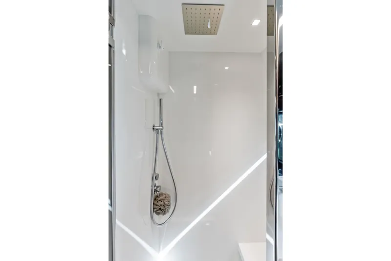 Il-viaggio Yacht Photos Pics Modern shower interior on 2021 Riva 56 Rivale yacht, featuring sleek design and fixtures.