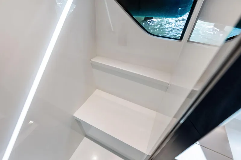 Il-viaggio Yacht Photos Pics Interior stairs of 2021 Riva 56 Rivale yacht with sleek design and window view.