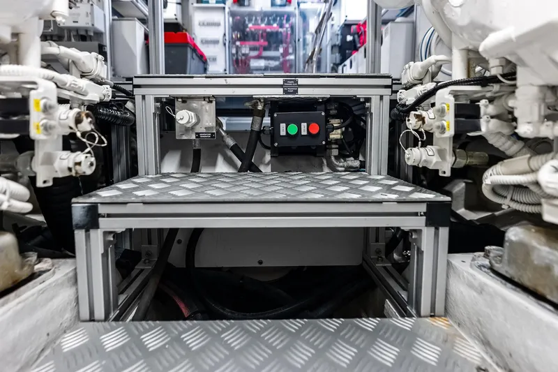 Il-viaggio Yacht Photos Pics Engine room of 2021 Riva 56 Rivale yacht, showcasing mechanical components and control systems.