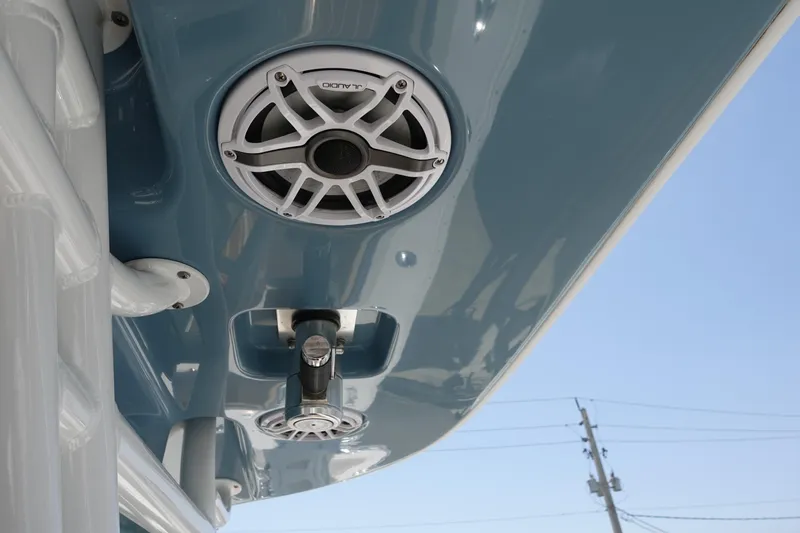  Yacht Photos Pics 2022 Cape Horn 34 XS boat with mounted speakers and blue canopy.