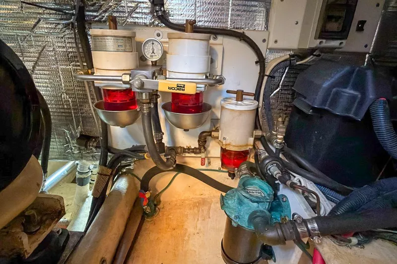 Dee Gee Yacht Photos Pics Engine room of a 1999 Nordic Tug 37 with fuel filters and hoses.