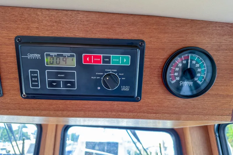 Dee Gee Yacht Photos Pics Control panel and gauge on a 1999 Nordic Tug 37 boat dashboard.