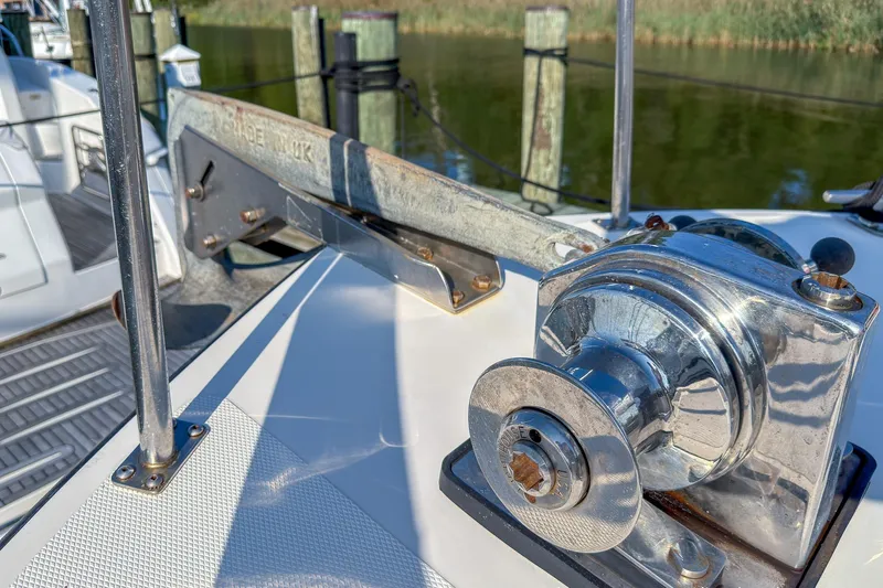 Dee Gee Yacht Photos Pics Close-up of a 1999 Nordic Tug 37 boat's winch and anchor mechanism.