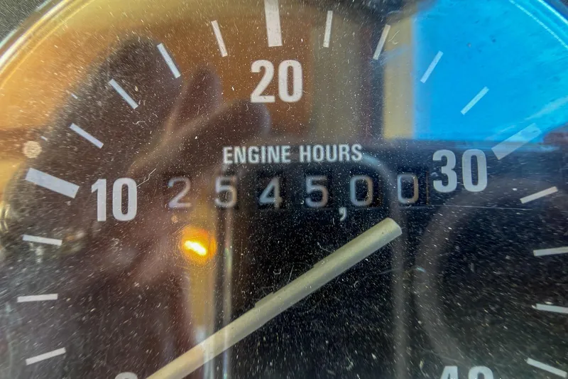 Dee Gee Yacht Photos Pics Close-up of Nordic Tug 37 engine hours gauge showing 25,450 hours.