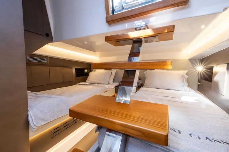 First Class Yacht Photos Pics Interior of 2022 Tesoro T38 Cruiser with twin beds and modern design.