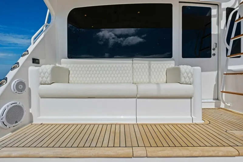 Summer Salt Yacht Photos Pics Luxury seating on 2006 Viking 56 Convertible yacht deck with ocean view.