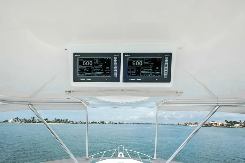 Summer Salt Yacht Photos Pics Helm view from 2006 Viking 56 Convertible yacht, featuring dual navigation displays.