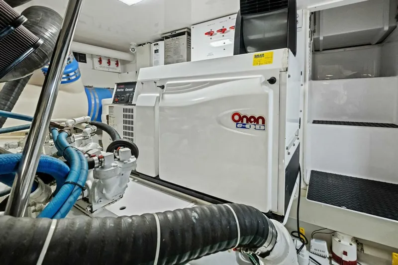 Summer Salt Yacht Photos Pics Engine room of 2006 Viking 56 Convertible with Onan marine generator.