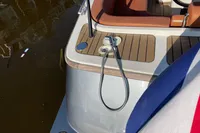 Luxury GS 27 boat deck with teak flooring and seating, 2022 model.