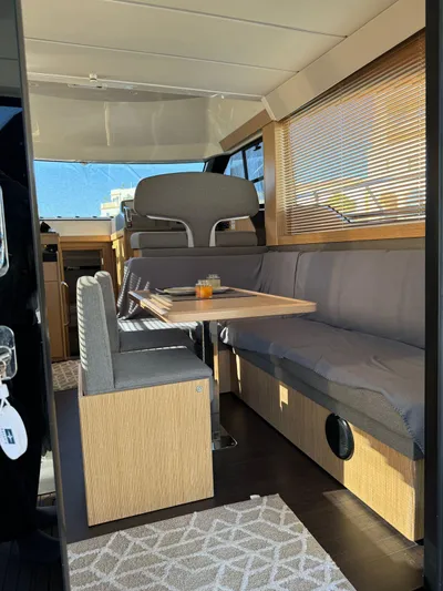 Lady V Yacht Photos Pics 2024 Bavaria Virtess 420 Fly interior with modern seating and dining area.