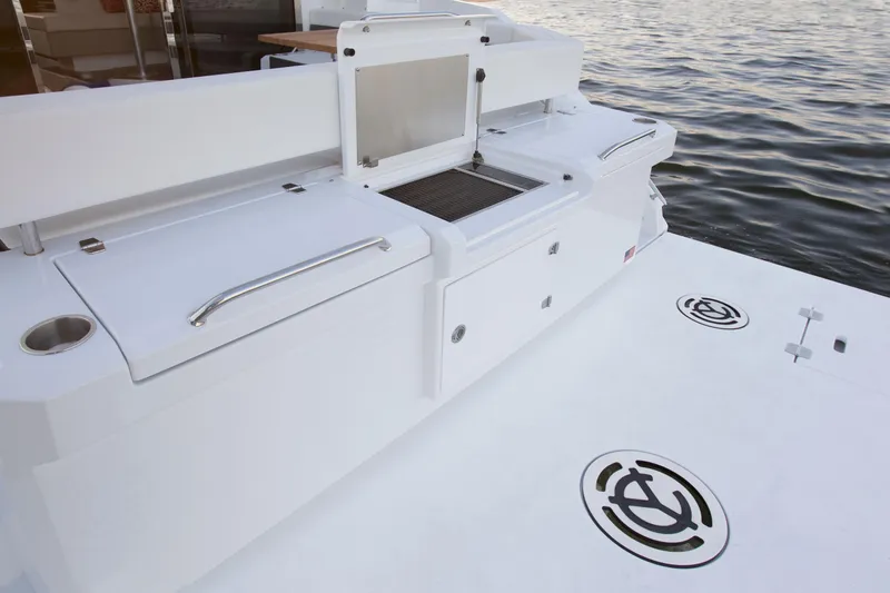  Yacht Photos Pics 2026 Cruisers Yachts 42 Cantius deck with sleek design and water view.