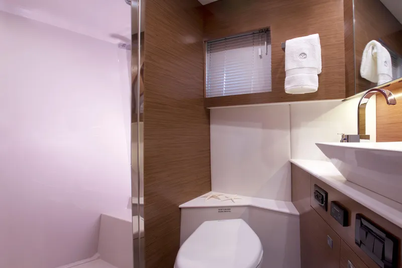  Yacht Photos Pics Luxurious bathroom in 2026 Cruisers Yachts 42 Cantius, featuring modern fixtures and elegant design.