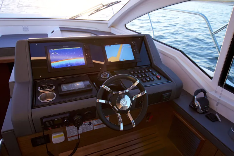  Yacht Photos Pics Helm of 2026 Cruisers Yachts 42 Cantius with advanced navigation displays and controls.