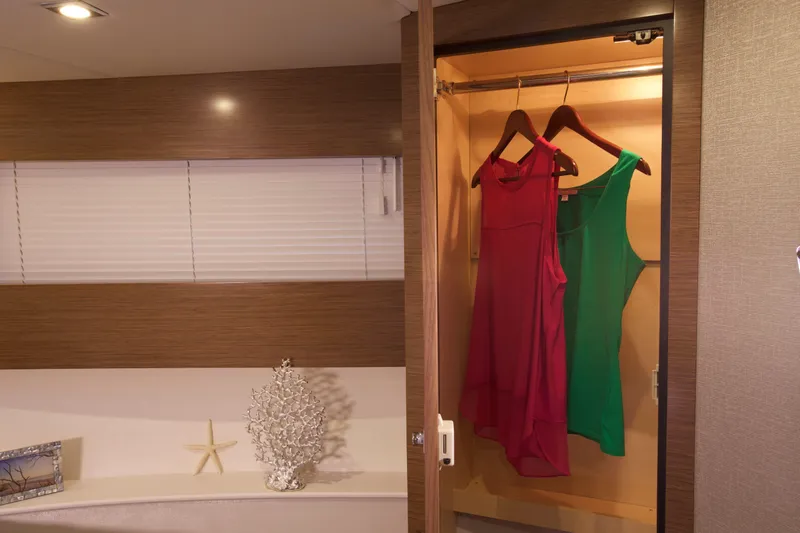  Yacht Photos Pics Interior of 2026 Cruisers Yachts 42 Cantius with closet and decor elements.