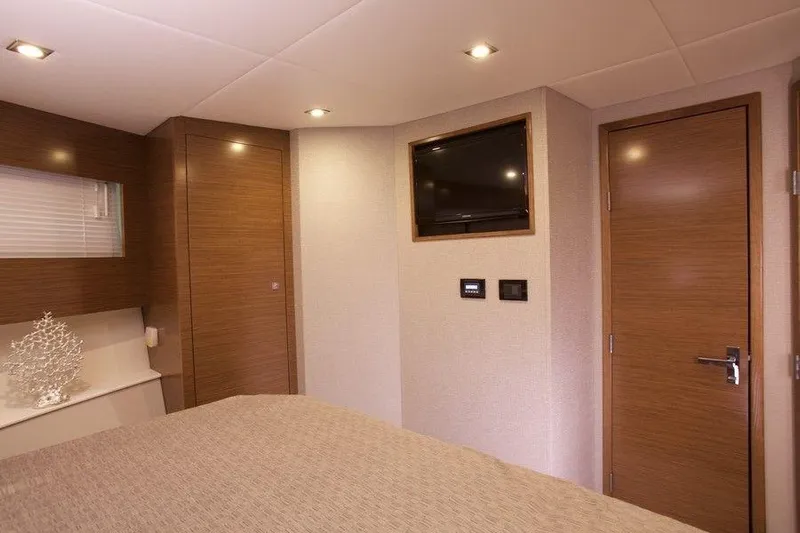  Yacht Photos Pics Luxurious interior of 2026 Cruisers Yachts 42 Cantius with modern wood finishes.