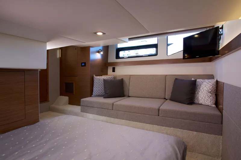  Yacht Photos Pics Luxurious interior of 2026 Cruisers Yachts 42 Cantius with modern seating and decor.