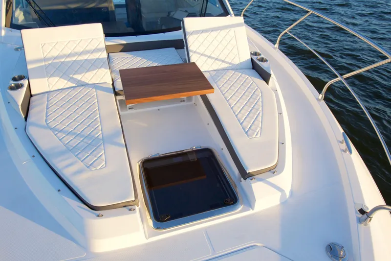  Yacht Photos Pics Luxurious 2026 Cruisers Yachts 42 Cantius with elegant deck seating and table.